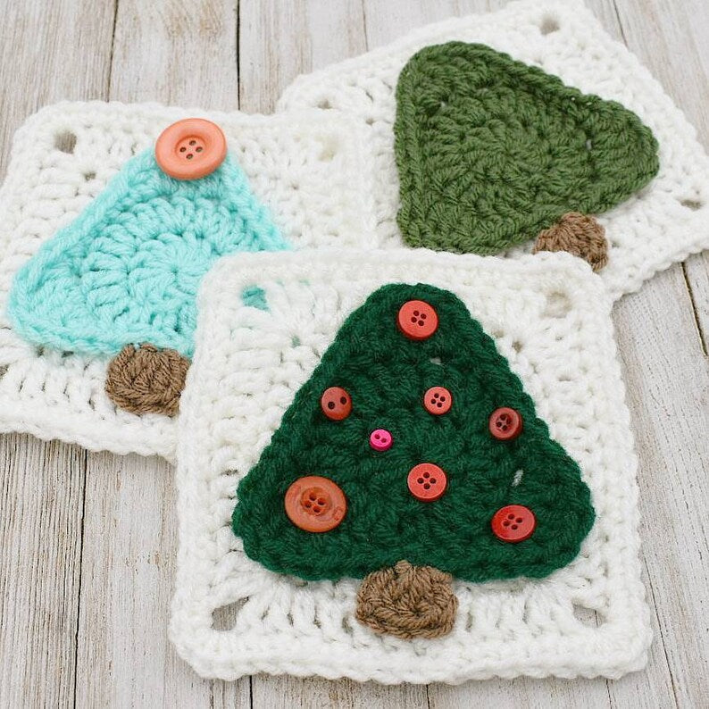 Finished Christmas Tree Granny Square crochet project in green, brown, and white yarn, approximately 6 inches square